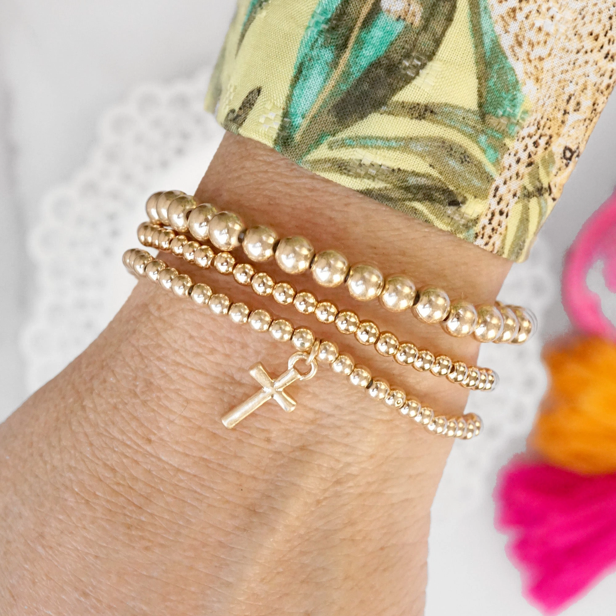 Unisex style Pan-Regional Amalgamations Minimal Cross charm Stretchy Bracelet Set in Worn Gold tone with Ball Beads