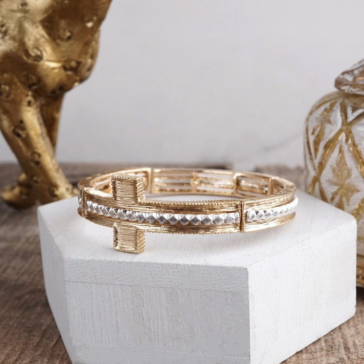 Golden Balance ?C Minimalist Sideways Cross Stretch Bangle Festive Glow Prime Cost