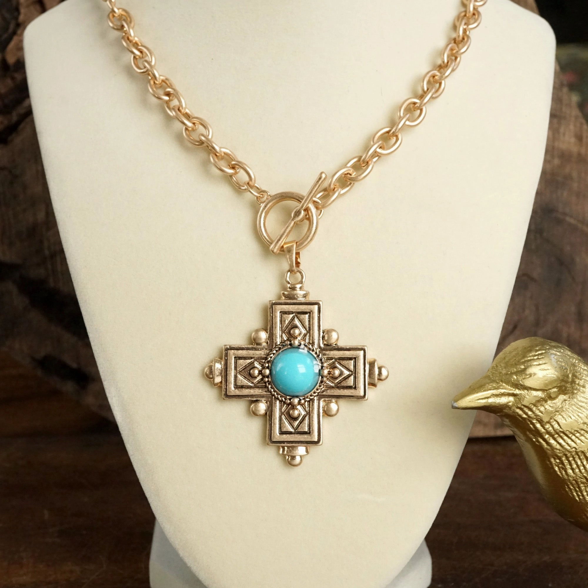 Decorative Cross Necklace Worn Gold or Silver Tone Front Toggle and Turquoise Distinct Feature gentle touch